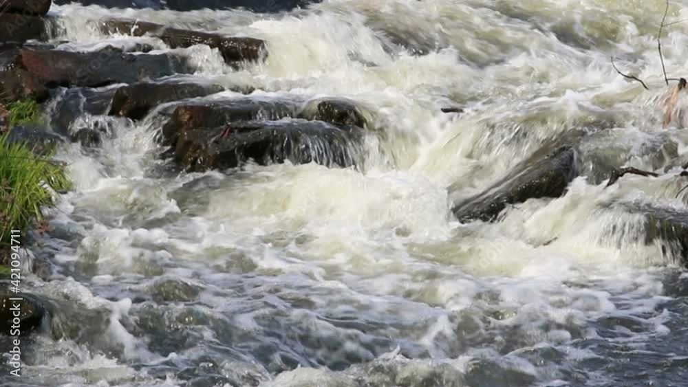 Waterfall on the river, nature background.
Waterfall on the river, nature background.