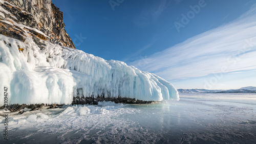 Rocks on Lake Baikal are covered with ice