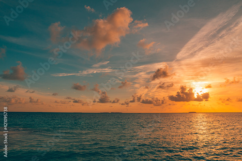Relaxing seascape with wide horizon of the sky and the sea. Colorful twilight dusk sunset sunrise water seascape horizon abstract background view. Panoramic view of the calm sea.