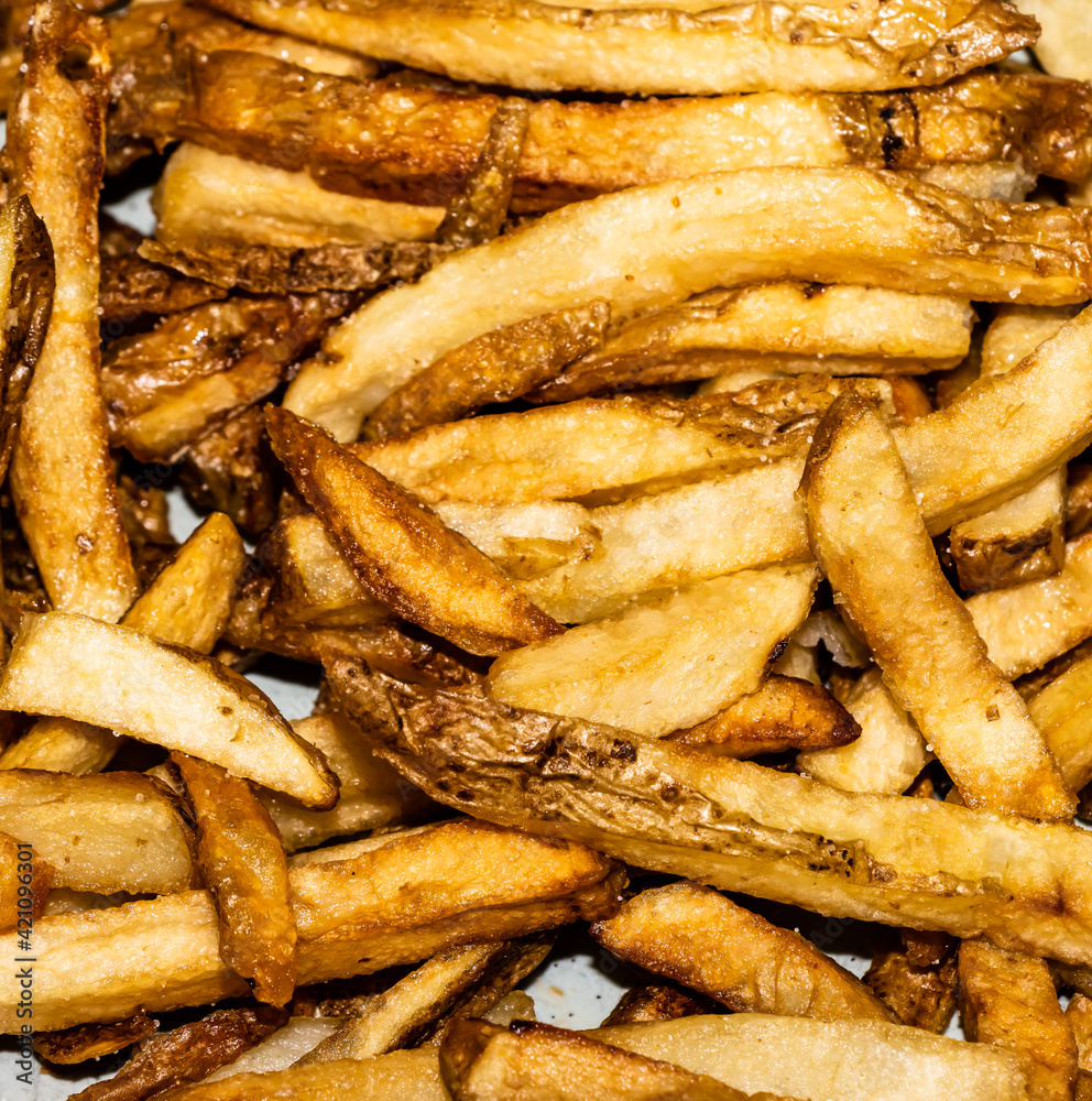 Close up image of greasy French fries Close up image of greasy French fries