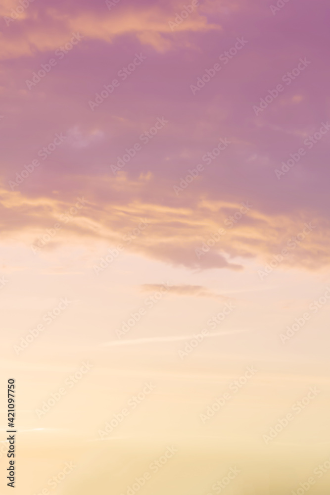 Vertical ratio size of sunset background. sky with soft and blur pastel colored clouds. gradient cloud on the beach resort. nature. sunrise. peaceful morning. Instagram toned style Vertical ratio size of sunset background. sky with soft and blur pastel colored clouds. gradient cloud on the beach resort. nature. sunrise. peaceful morning. Instagram toned style