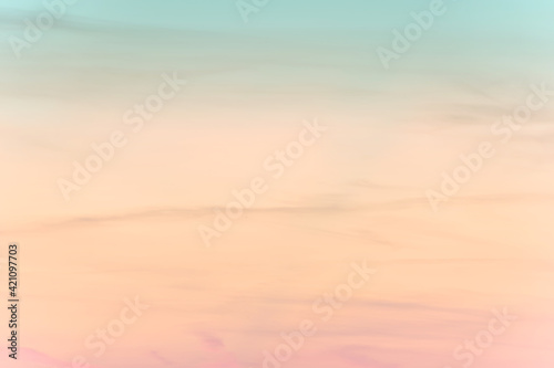 sunset background. sky with soft and blur pastel colored clouds. gradient cloud on the beach resort. nature. sunrise. peaceful morning. Instagram toned style