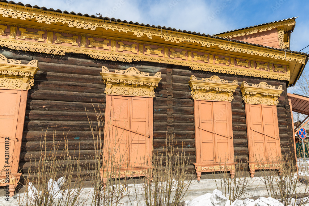 wooden carved Window in the old wooden house in the old town Ulan-Ude wooden carved Window in the old wooden house in the old town Ulan-Ude
