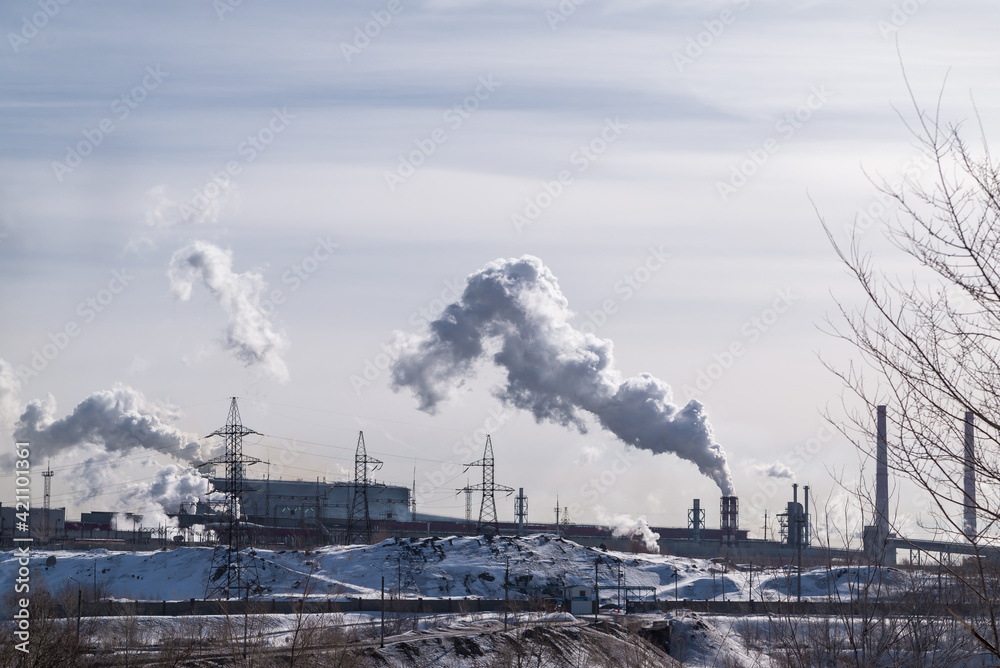 Pollution by pipes of industrial enterprises and factories. Industrial chimneys urban landscape power plants pollution steam landscape.the concept of environmental pollution