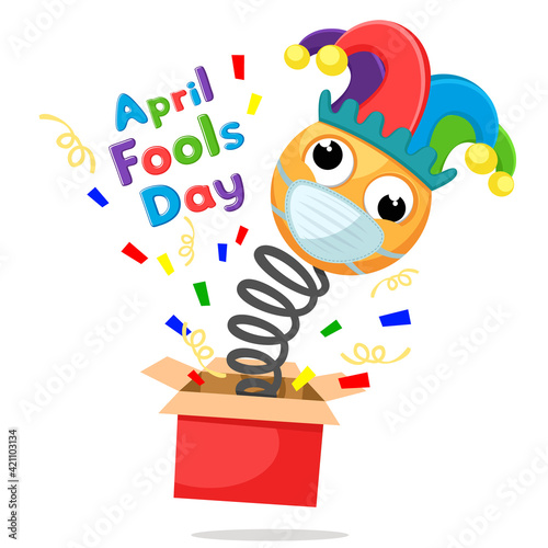 A smiley in a medical mask jumps out of a box. April Fools Day