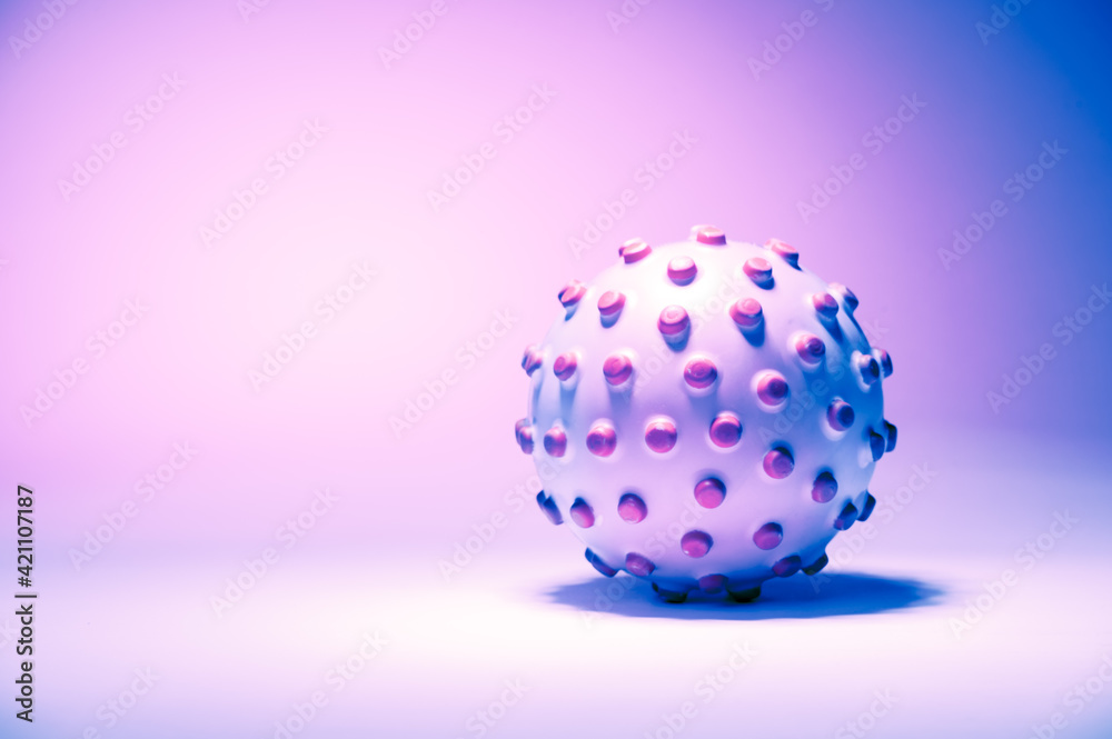 Concept image of the coronavirus on a pink background, tinted in light pink Concept image of the coronavirus on a pink background, tinted in light pink