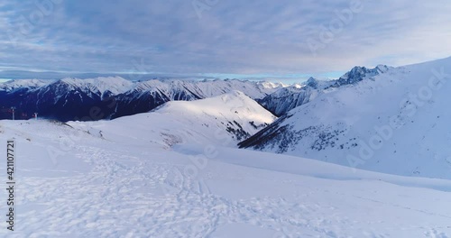 Snowy mountains of the Caucasian ski resort piste
