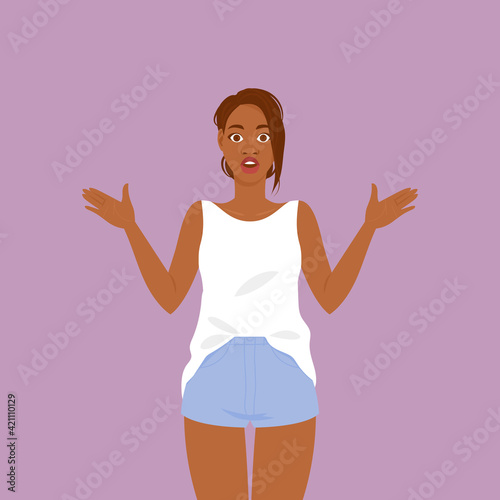 Very surprised black girl in a blouse and jeans throws up her hands in amazement