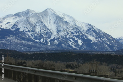 Snow topped mountain in the distant landscape