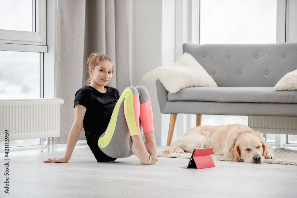 Girl making workout with tablet Girl making workout with tablet