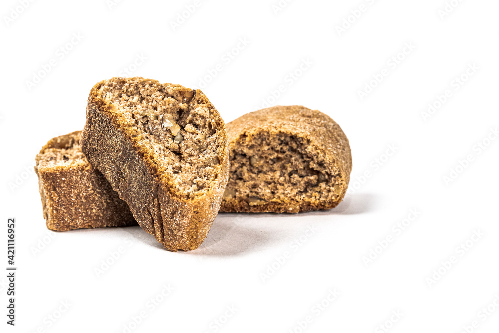 Biscuit croutons with walnuts against white background Biscuit croutons with walnuts against white background
