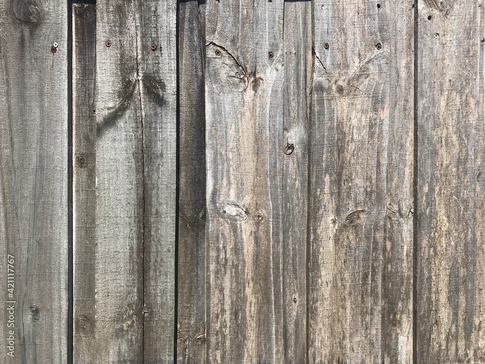 Distressed wooden fence panels close-up Distressed wooden fence panels close-up