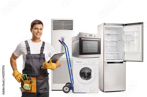 Handyman with domestic electrical appliances photo