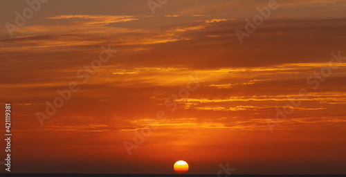 Fototapeta Naklejka Na Ścianę i Meble -  sunrise over the ocean and beautiful clouds