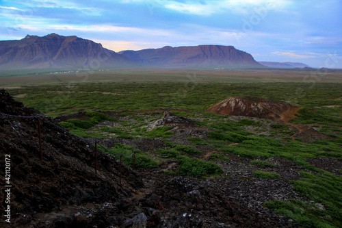 View from Eldborg crater and hiking trail in the evening sun, Snaefellsnes peninsula, Iceland photo