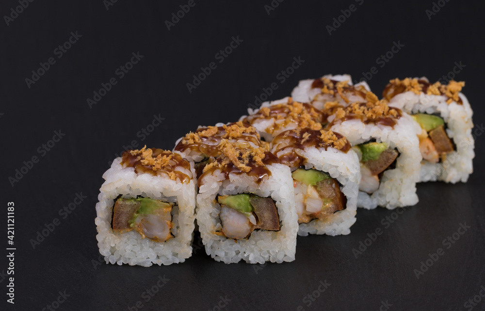 Sushi rolls Roll on black background. Sushi menu. Japanese food Sushi rolls Roll on black background. Sushi menu. Japanese food
