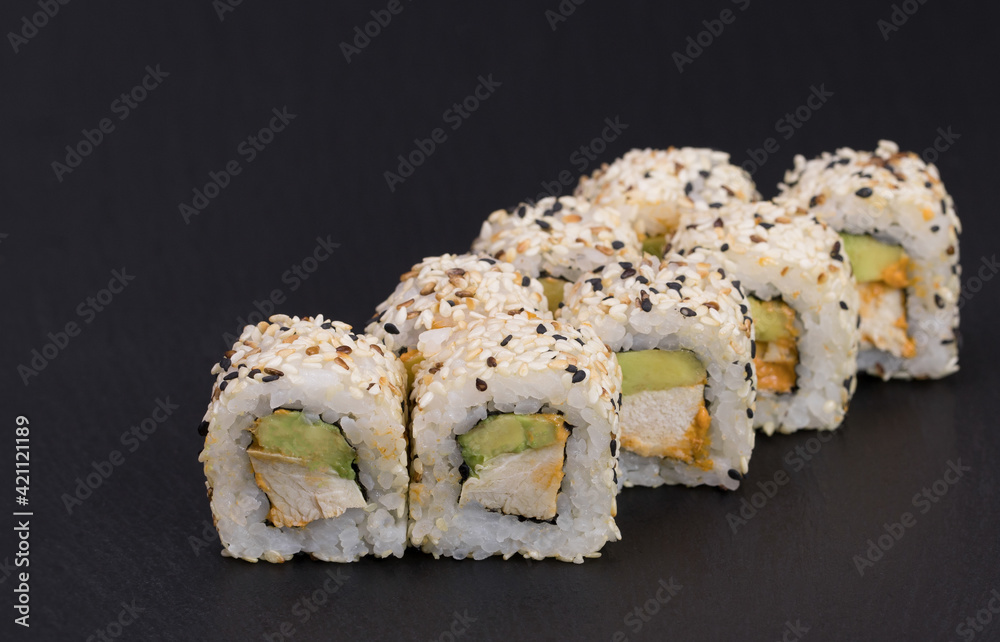 Sushi rolls Roll on black background. Sushi menu. Japanese food Sushi rolls Roll on black background. Sushi menu. Japanese food