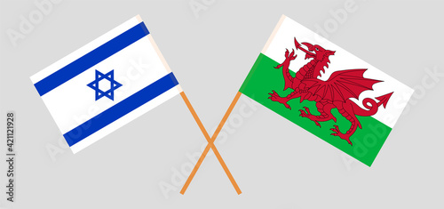 Crossed flags of Israel and Wales. Official colors. Correct proportion