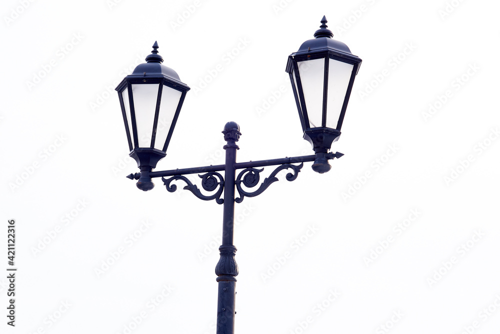 Vintage street lamp isolated on white background.