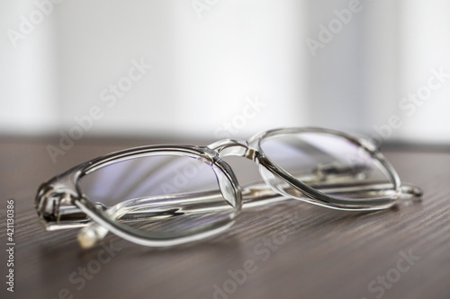 Eyeglasses close up. Eye glasses. Modern style eyeglasses. Round glasses with transparent lenses.