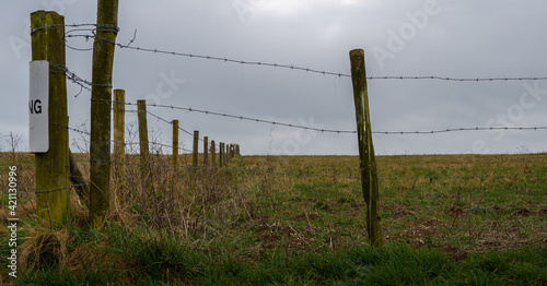 the corner a barbed wire cattle fence on Salisbury Plain Wiltshire