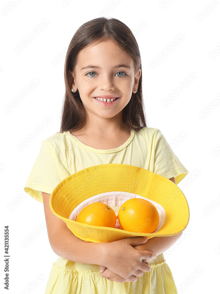 Cute little girl with oranges on white background Cute little girl with oranges on white background