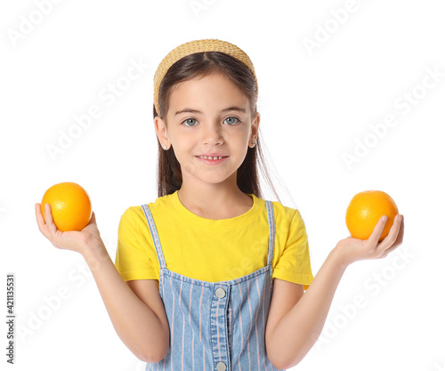 Cute little girl with orang...
