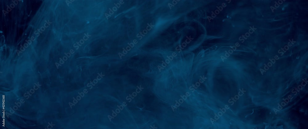 Light blue smoke effect in dark water Light blue smoke effect in dark water