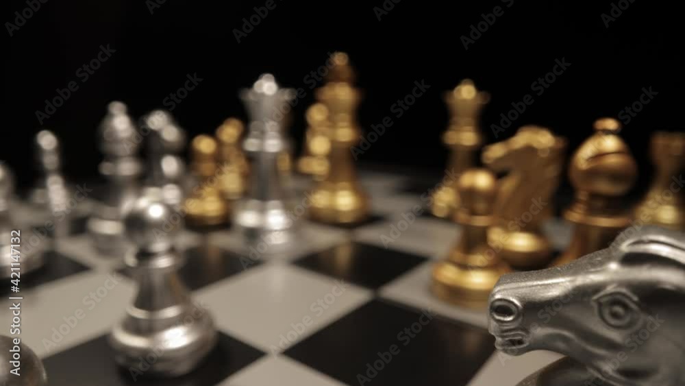 A chessboard in close-up - sliding shot - macro view A chessboard in close-up - sliding shot - macro view