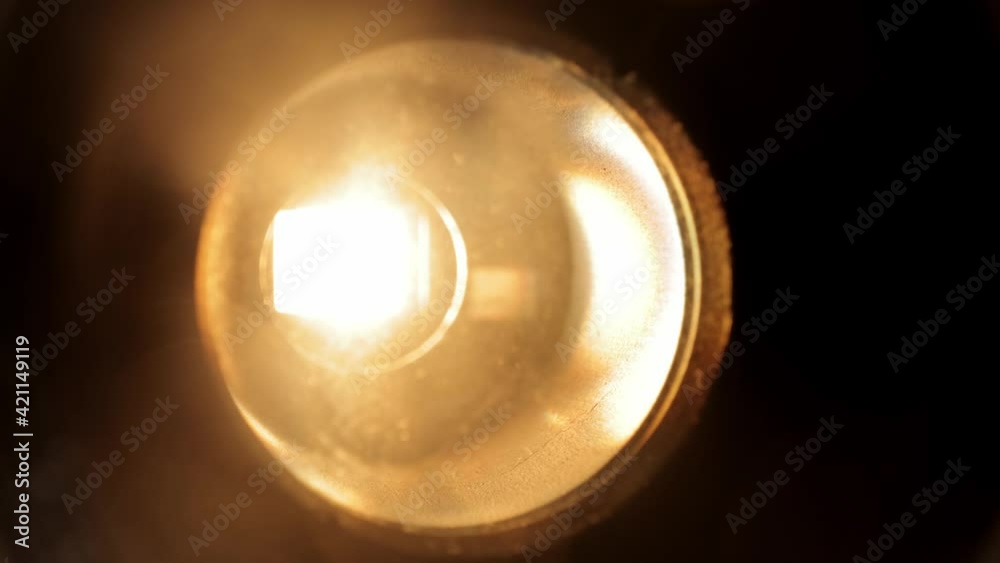 Lens of an old movie projector in close up view - macro shot