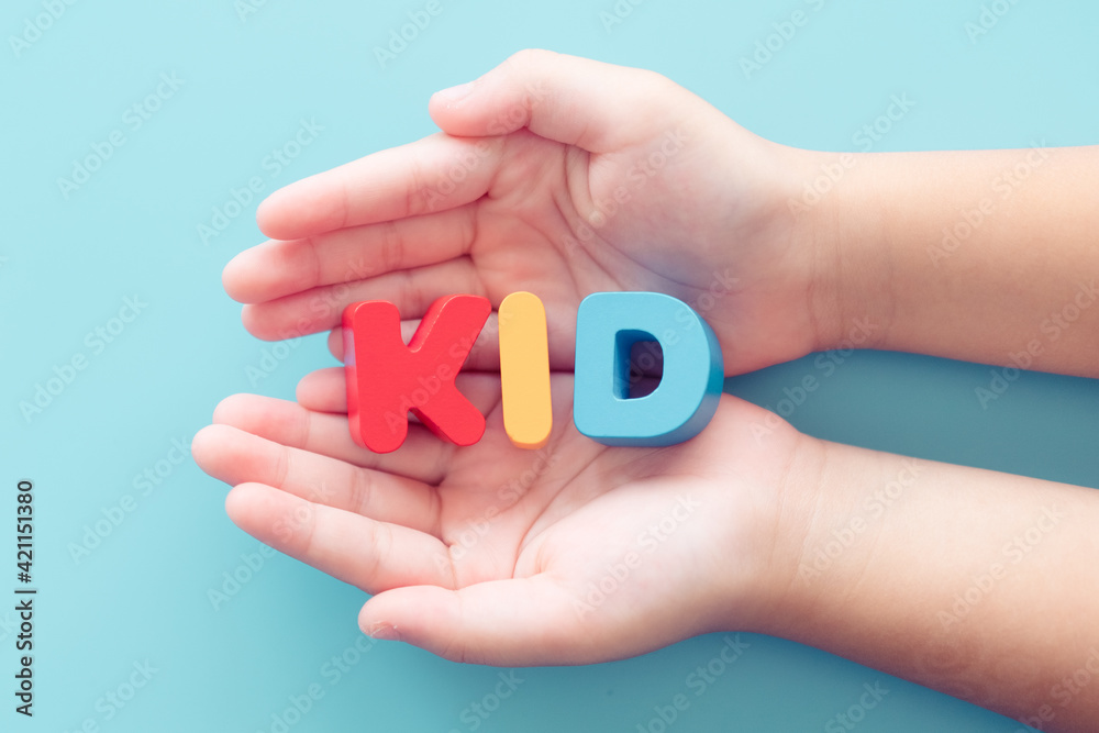 Kid word on woman hands.Family adoption.Safe and protect child kids.bully in school.Pediatric healthcare medical.Kid Vaccine.Online education learning at home.New normal boy and girl.People children.