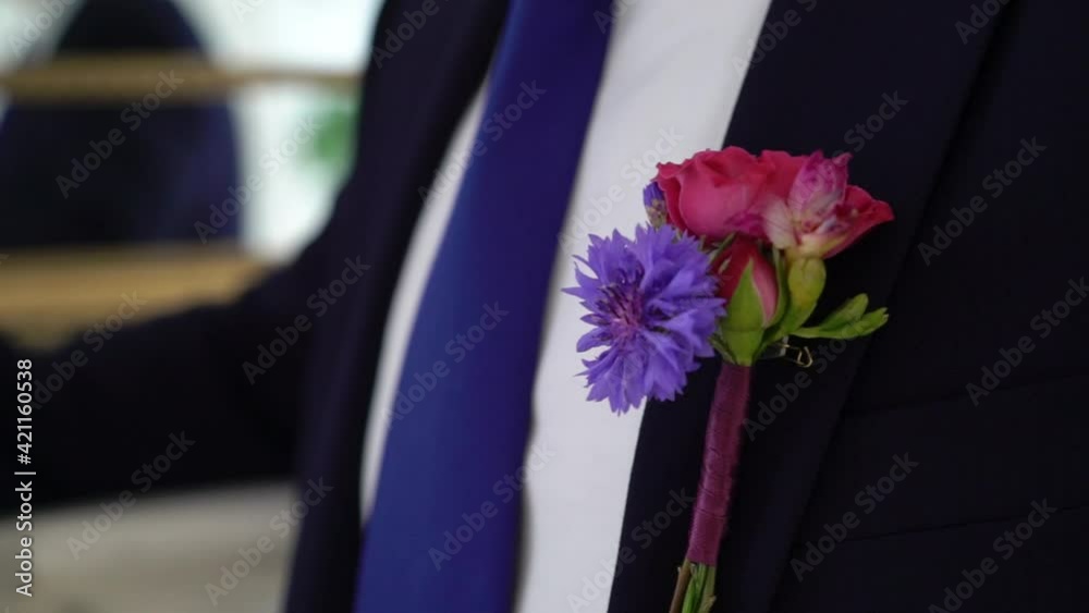 Boutonniere for groom in wedding day, lovely couple. High quality FullHD footage