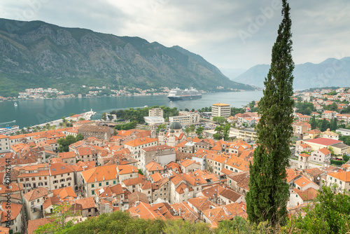 Kotor Bay and terracotta tiled rooftops viewed from above the Old Town,Kotor,Montenegro.