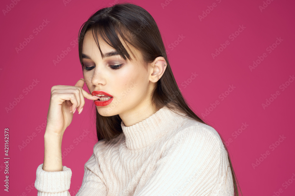 Woman with red lips bright makeup white blouse long hair pink background Woman with red lips bright makeup white blouse long hair pink background