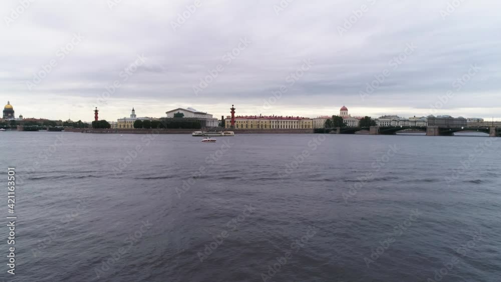 City river Neva with view at Isaac cathedral and Rostral columns aerial. High quality FullHD footage City river Neva with view at Isaac cathedral and Rostral columns aerial. High quality FullHD footage