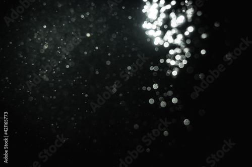 Glittering stars of blur white bokeh