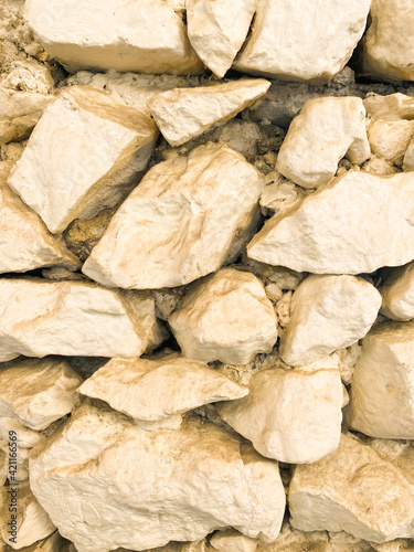 Abstract background of an artificial wall made with rocks