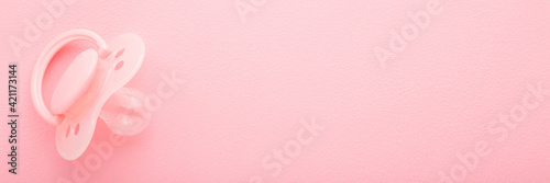 One silicone baby soother on light pink table background Tapéta, Fotótapéta