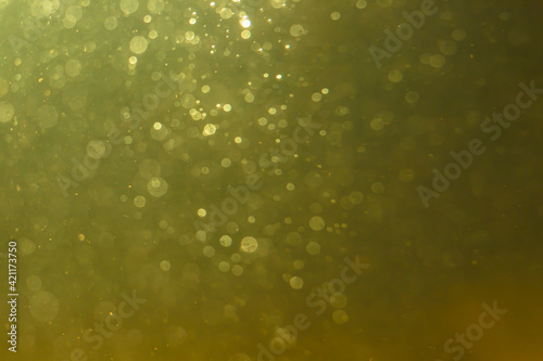 Abstract glitter gold bokeh