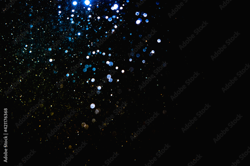 Glittering stars of blur blue bokeh Glittering stars of blur blue bokeh