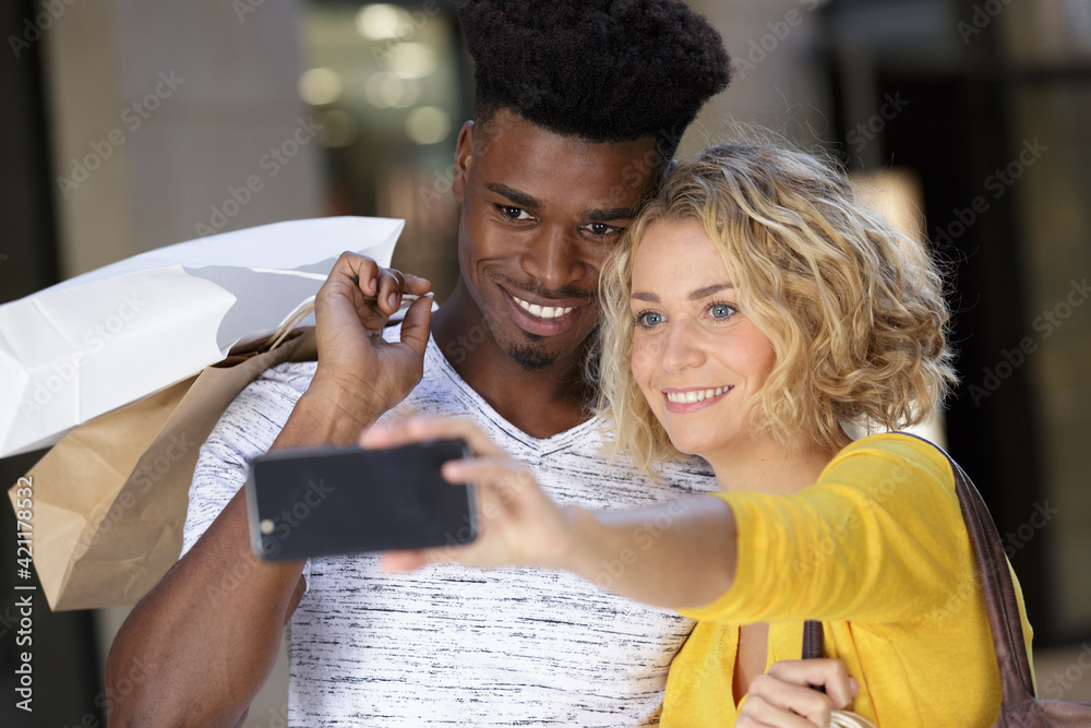 couple doing a selfie while having fun together