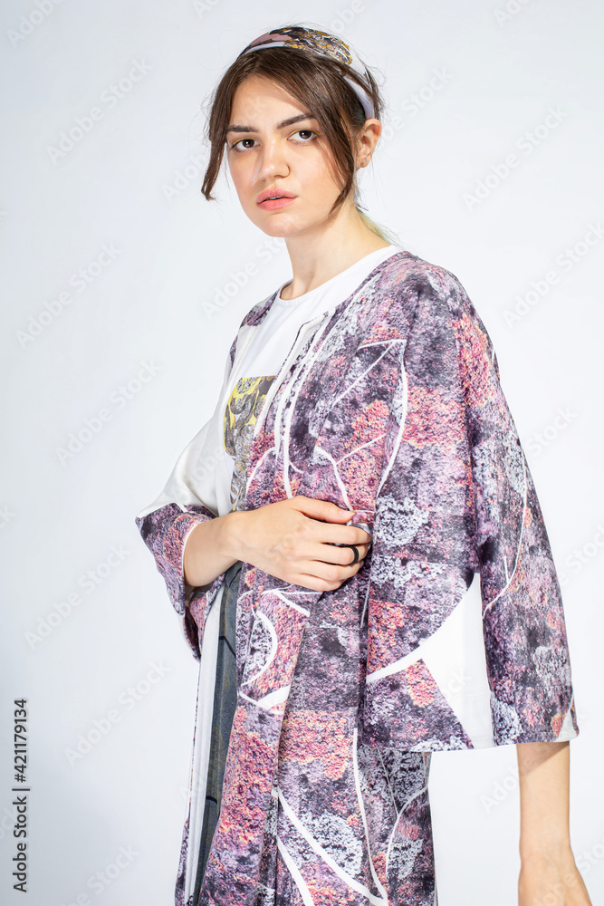 Young white woman isolated on light grey Young white woman isolated on light grey