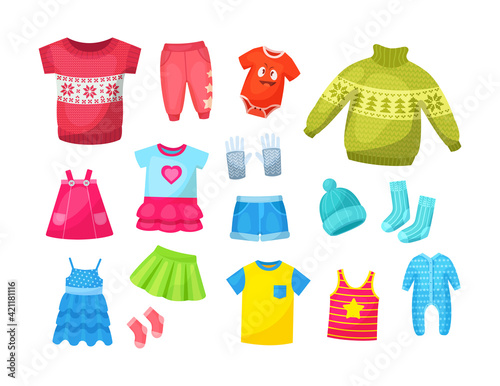 Cute knitted warm winter clothing and summer baby clothes. Christmas sweaters with festive winter year ornaments. Shorts, socks, sweater, hat, T-shirt, sarafans, dress, skirts, blouse cartoon