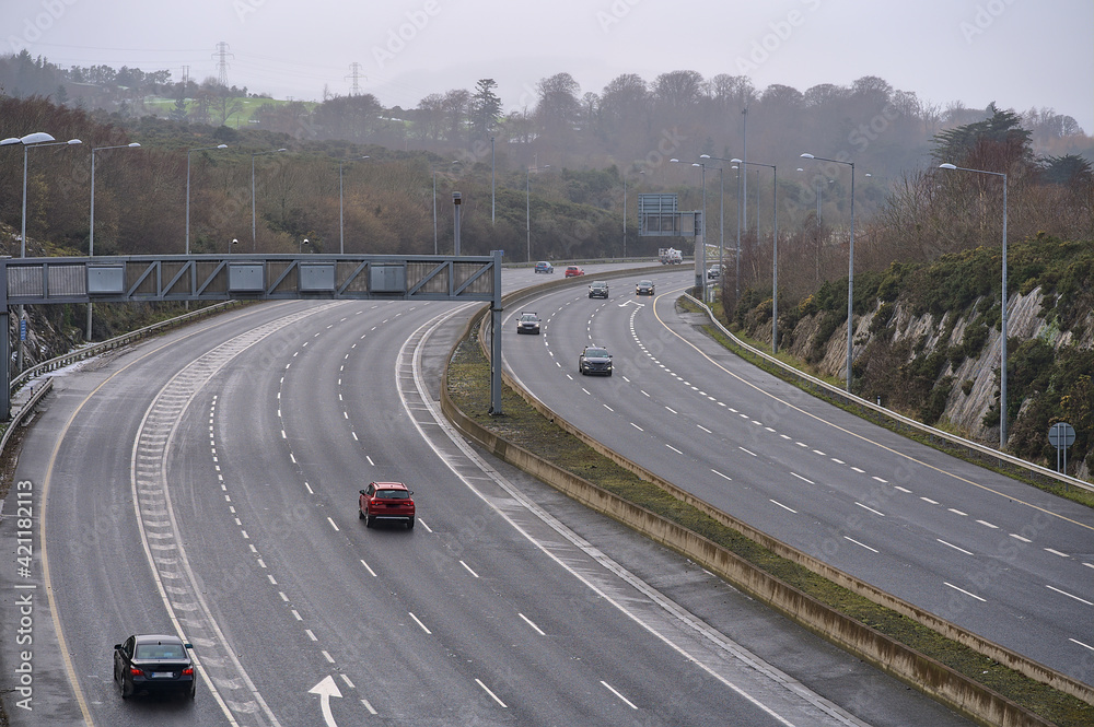 Coronavirus causing empty highways. Free motorway during the COVID-19 quarantine, Dublin, Ireland, January 2020. Photo taken in the early evening, when usually the road is very busy Coronavirus causing empty highways. Free motorway during the COVID-19 quarantine, Dublin, Ireland, January 2020. Photo taken in the early evening, when usually the road is very busy