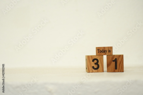wood blocks with word pn white wall background
