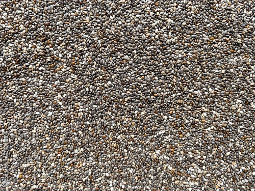 Chia seeds background texture close up.  A source of protein, vitamins A, E and omegas in vegan diets.