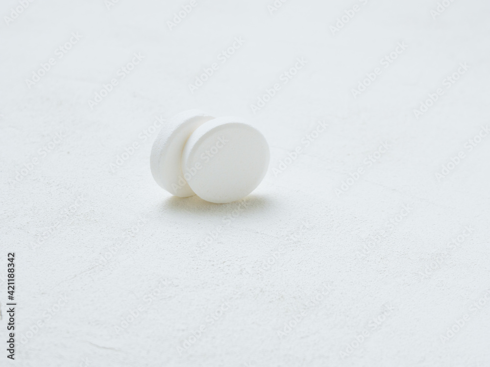 Pill of aspirin on white background. Pill of aspirin on white background.