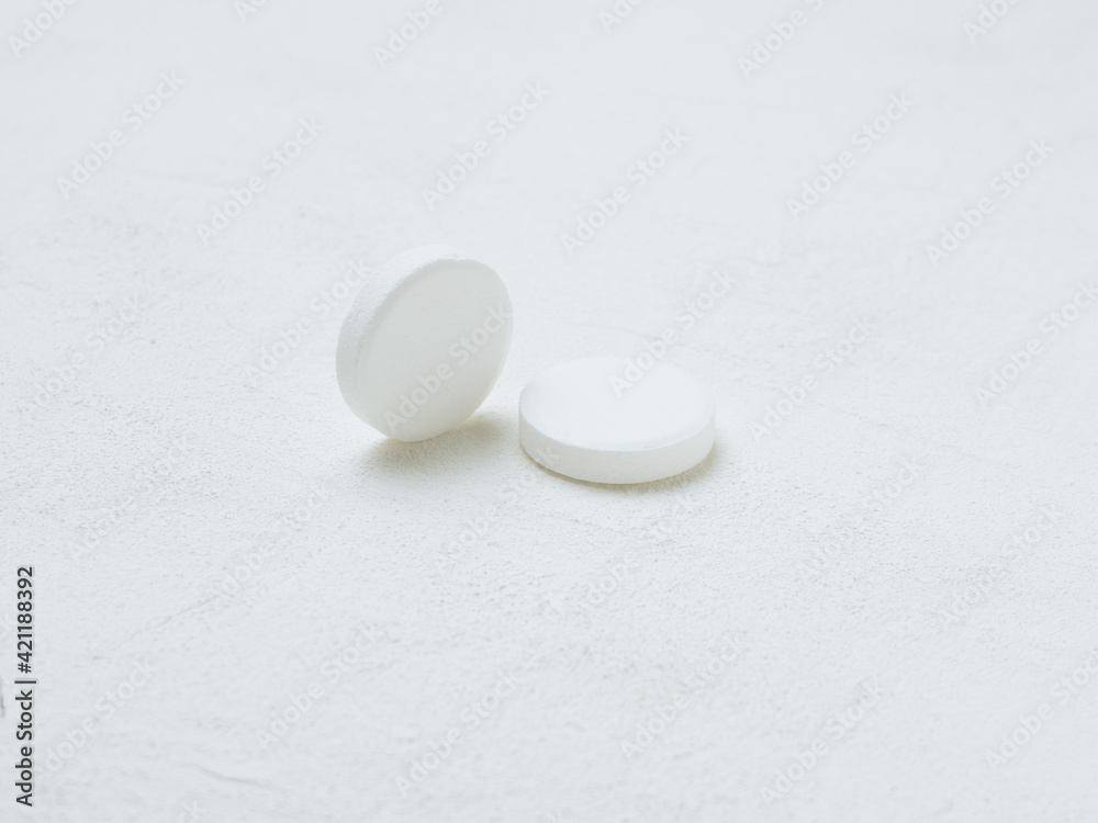 Pill of aspirin on white background. Pill of aspirin on white background.