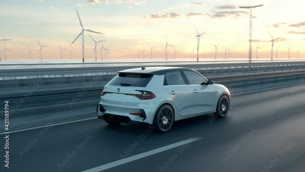 Generic electric car driving along a bridge or coastal highway into the sunset with wind turbines in background. Green energy concept. Realistic 3d animation.