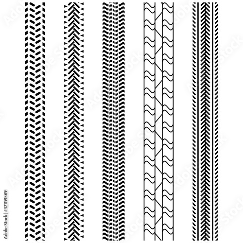 Set of abstract seamless silhouettes of tire-tracks